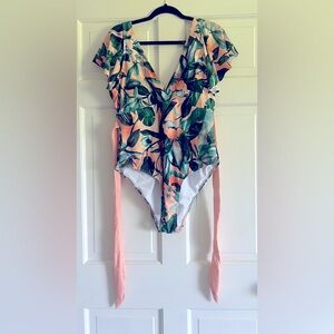 Beautiful, tropical design, pink and green, full price bathing suit size 2XL.